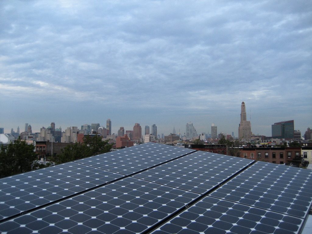 solar panels with Brooklyn skyline